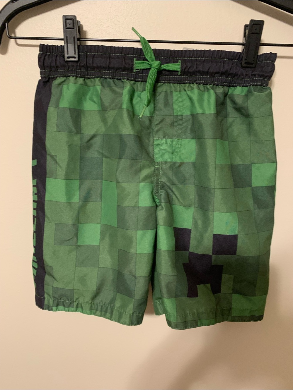 Kids Green Checkered Swim Trunks with Black Waistband. Size S